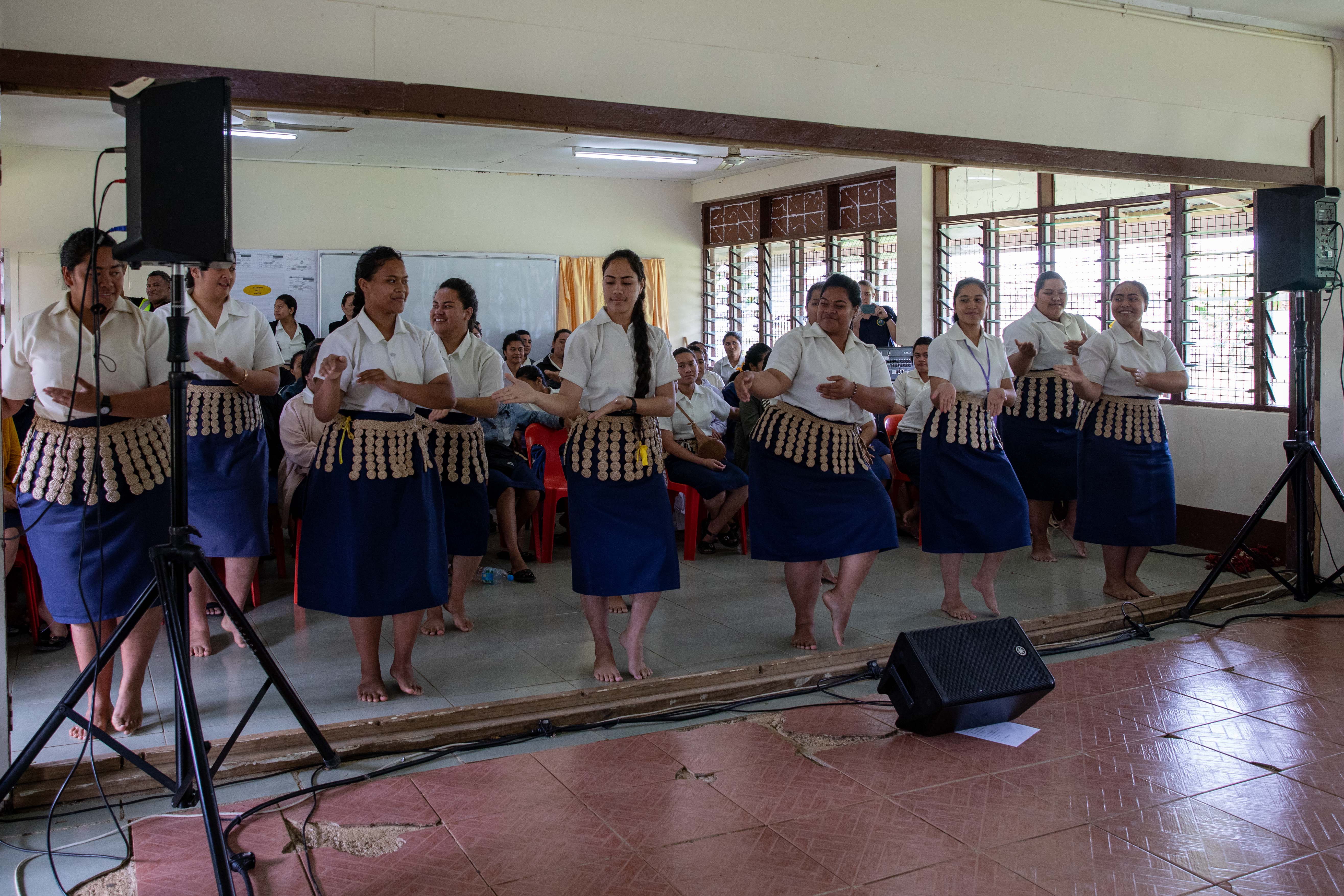 SJBC students performing a traditional Tongan dance together at a college event